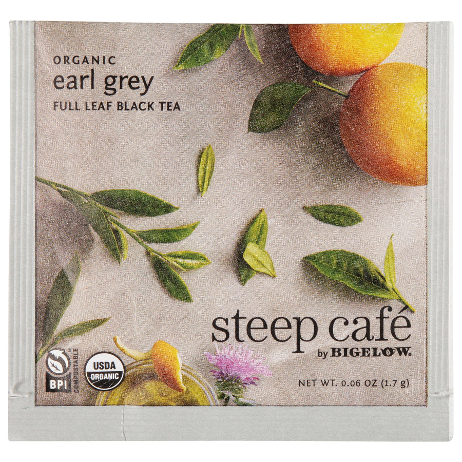 Tea package for steep cafe organic earl grey tea with leaves and oranges on a beige background