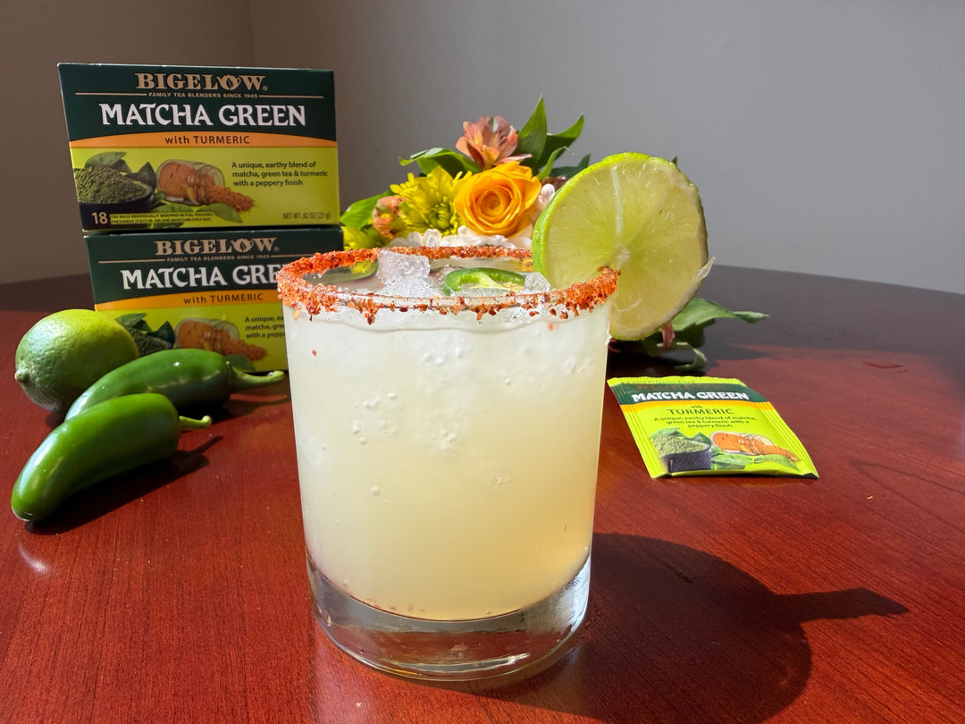 Spicy Matcha Margarita in glass with box of  Bigelow Matcha Green Turmeric tea