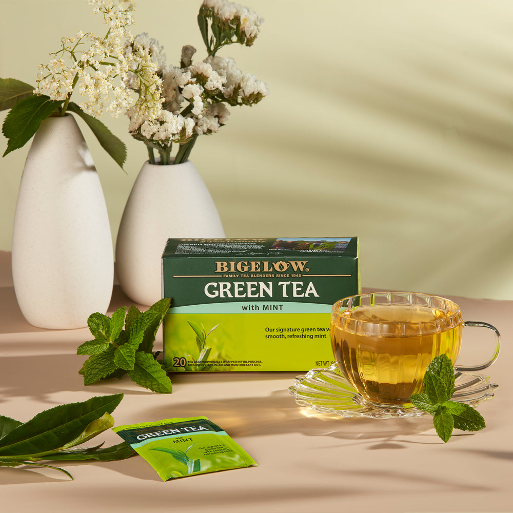 Glass Cup of Green Tea with Mint and tea box