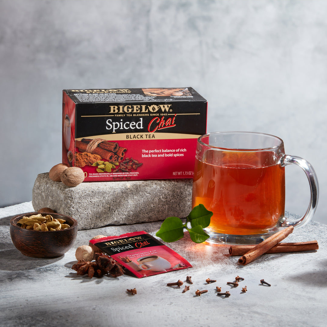 Glass Cup of Spiced Chai Tea and tea box