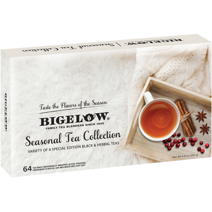Bigelow Seasonal Tea Collection packaging with a cup of tea and tea leaves on a white background