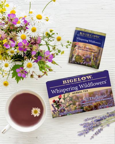 Cup of Whispering Wildflowers Plus L-Theanine Herbal Tea with box and foil packet