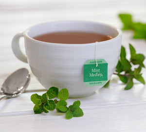 Bigelow Tea | Cup of tea with Mint Medley tea tag displayed
