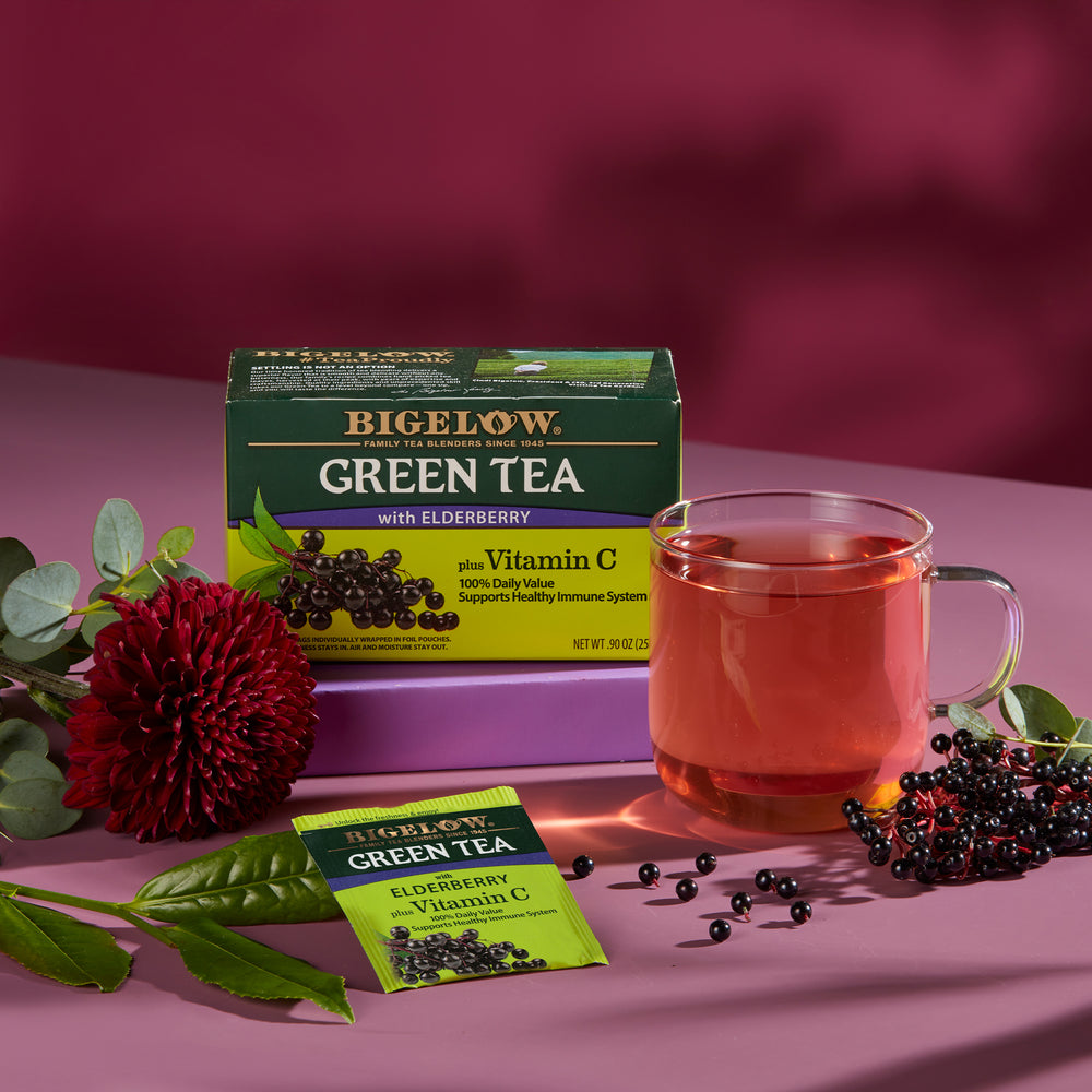 Glass Cup of Green Tea with Elderberry plus Vitamin C with tea box