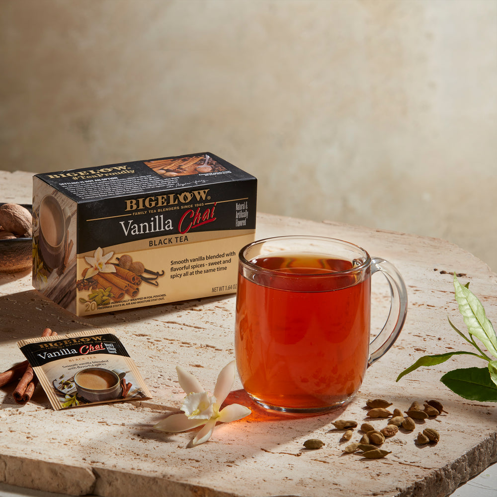 Glass Cup of Vanilla Chai Tea and tea box