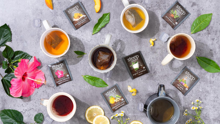 Cups of the Assortment of steep by Bigelow teas showing ingredients