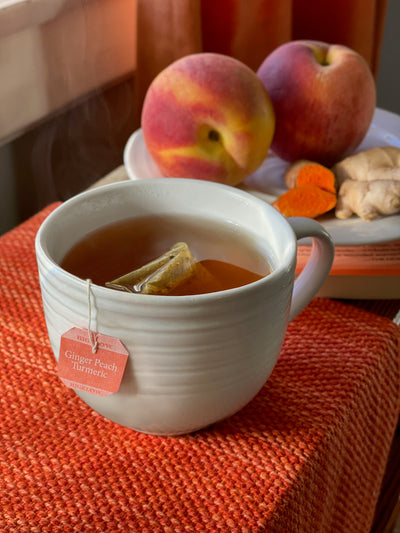 Cup of Ginger Peach Turmeric Herbal Tea
