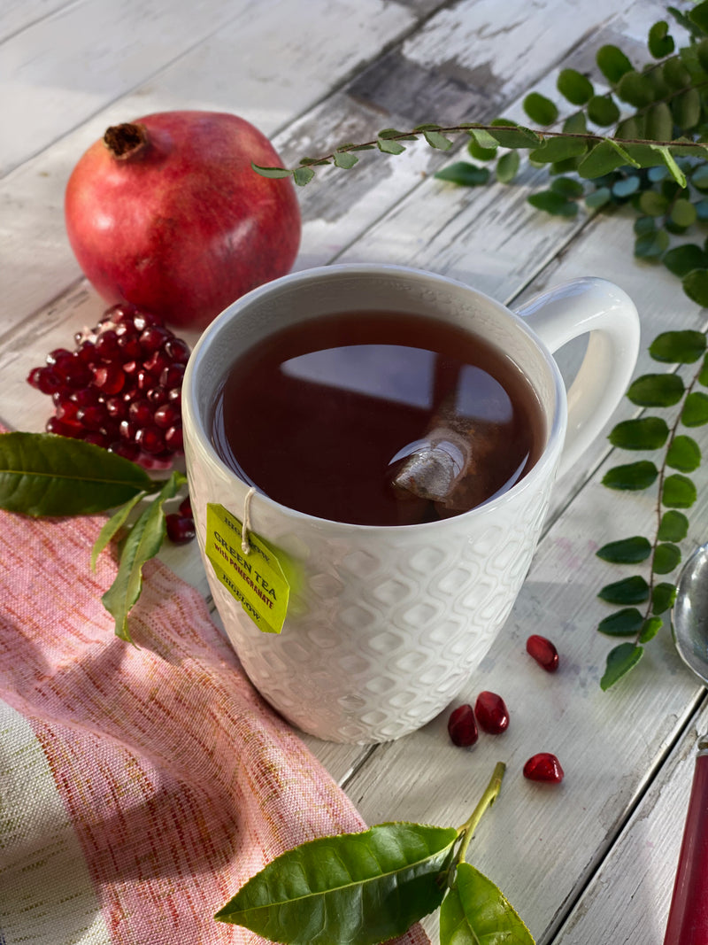 Cup of Green Tea with Pomegranate